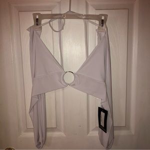 Pretty little thing, white tie top, ring in middle